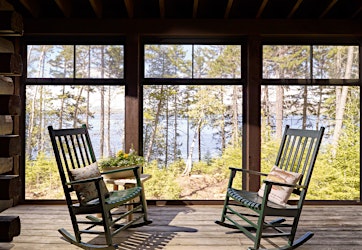 Three-season porch on a log home (Gentleman’s Camp)